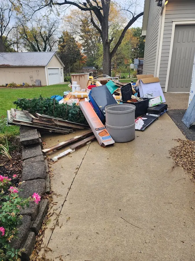 Dumpster being loaded with debris for 3 Yard Dumpster Rental in Cicero